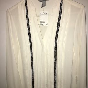 Cream blouse with pretty details